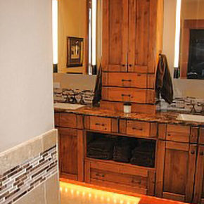 bathroom with ornate wood furnishings.